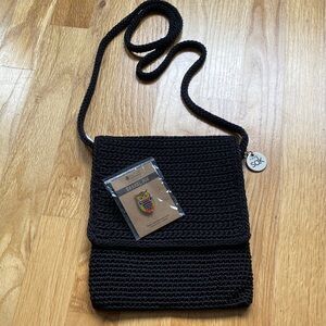 The Sak Black Crochet Shoulder Bag with Enamel Owl Pin